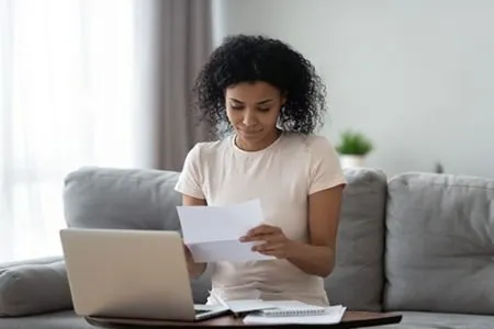 woman looking at financial options